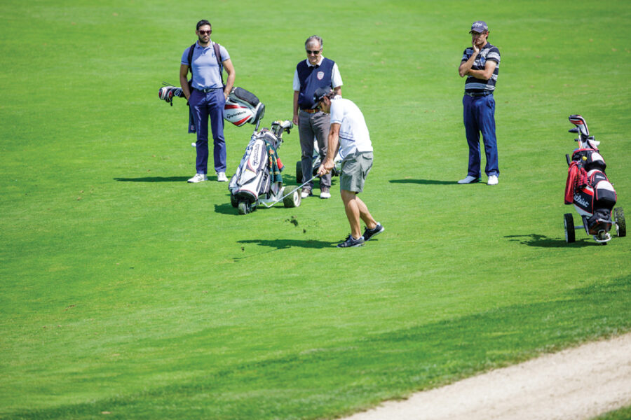 Golf players playing